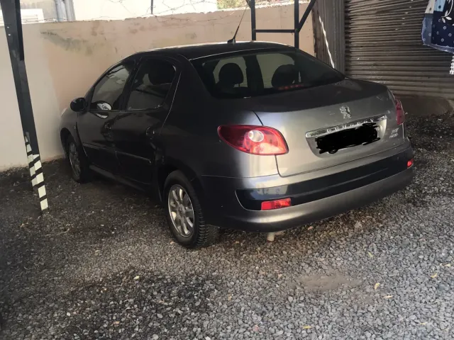 Peugeot 207 compa