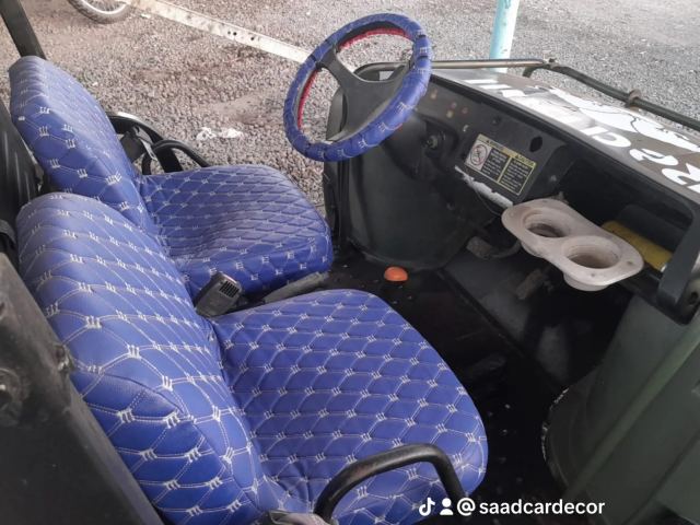 Buggy utilitaire 6x6 avec benne, housses de sièges bleues