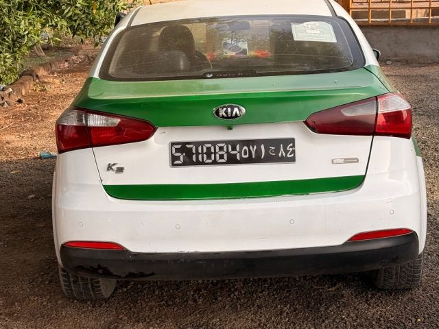 Kia k3 2015 berline verte et blanche à vendre - photo 3 sur 7